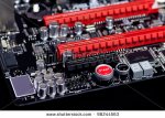 stock-photo-modern-pc-motherboard-macro-with-power-and-reset-buttons-98244563.jpg