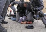 Knee.neck_.IsraeliPolice.3-597x410.jpeg