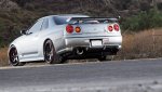 turp_0812_11_onissan_skyline_r34_gtrrear_shot.jpg