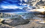 water_flows_through_an_icey_landscape.1920x1200.94093736.jpg